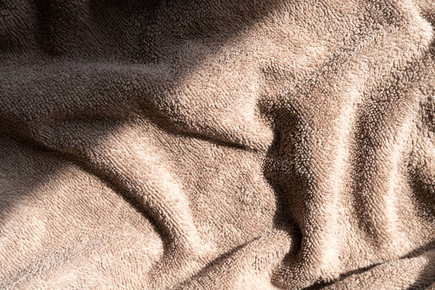 istock Brown terry towel close-up 2159626797