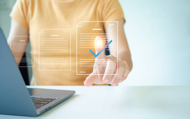 istock Quick checklist and clipboard management concept, businesswoman working checklist questionnaire assessment form, checking laptop performance and filling out online survey, efficient management. 2159628175