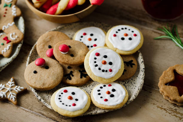 istock Gingerbread cookies decorated for Christmas on festive table 2159630273