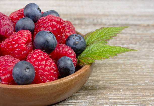A healthy serving of fresh summer berries. Creative atmospheric decoration