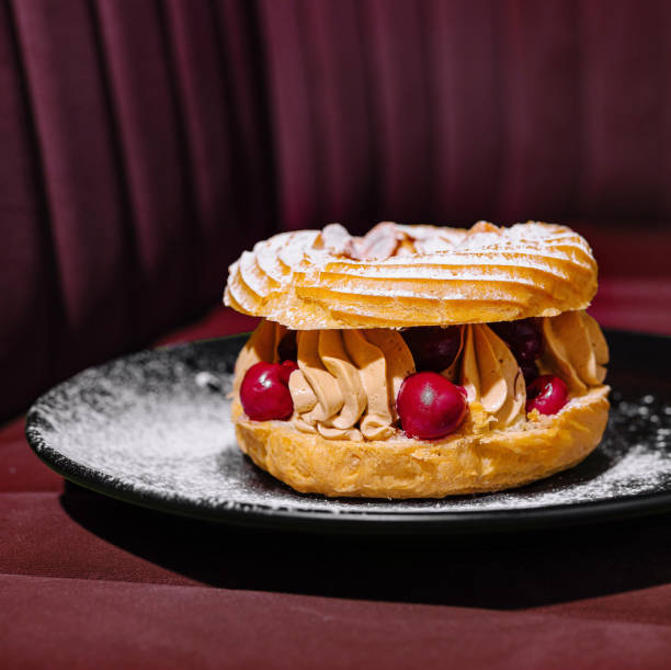 istock Gourmet paris-brest pastry on elegant plate 2159632580
