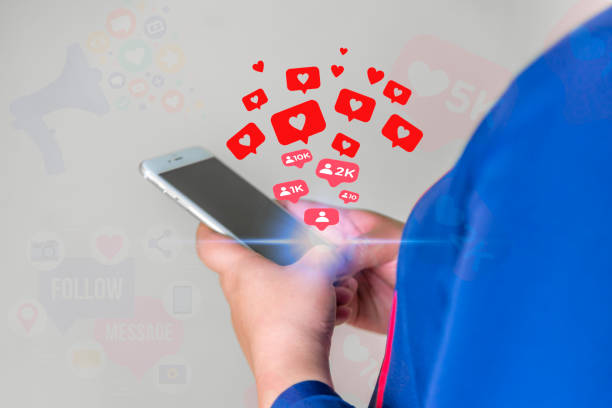 istock Comment and Like concept, Women using smart phone mobile with, Social Media, Blurred background 2159632695