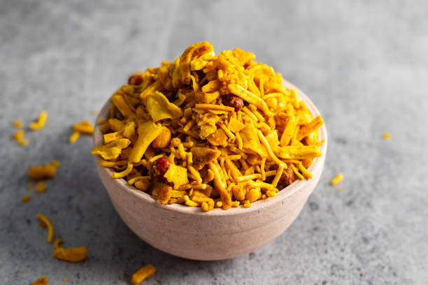 istock selective focus of Indian snacks Bombay Mix on a bowl. 2159632901