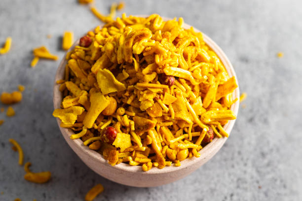 istock selective focus of Indian snacks Bombay Mix on a bowl. 2159632914