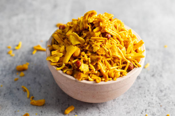 istock selective focus of Indian snacks Bombay Mix on a bowl. 2159632916