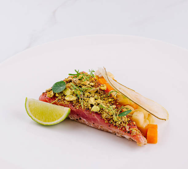 istock Gourmet tuna tartare with fresh herbs and lime 2159633798