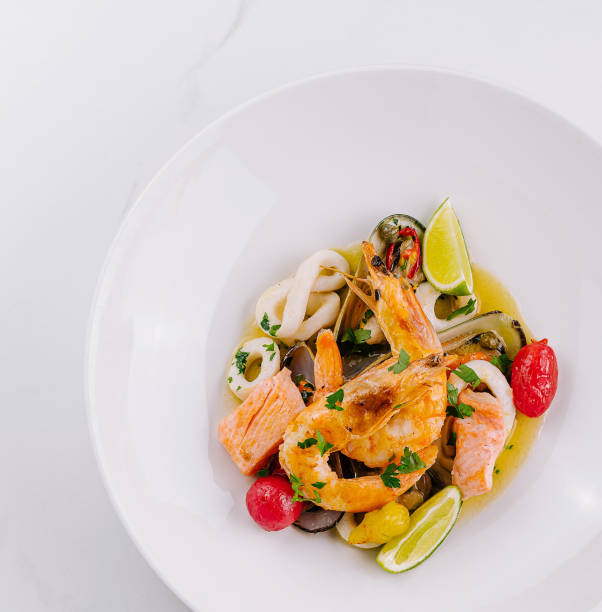 Gourmet grilled salmon dish on marble background