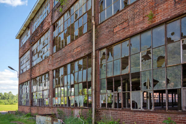 istock Broken windows of an abandoned factory, lost place 2159634919