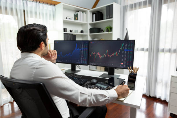 istock Trader analyzing in dynamic stock exchange investment screen on pc. Surmise. 2159636223