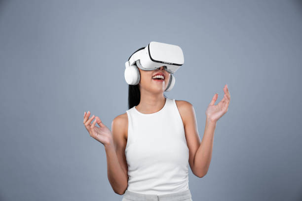 istock Elegant female stand excited seeing virtual scenery in metaverse. Hallucination. 2159637194