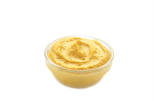 istock Mustard sauce in glass bowl isolated on white background. Top view. Flat lay 2159637706