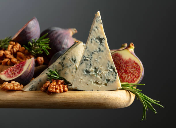 istock Blue cheese with figs, walnuts, and rosemary. 2159640131