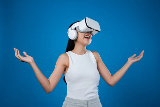 istock Elegant female stand excited seeing virtual scenery in metaverse. Hallucination. 2159641073