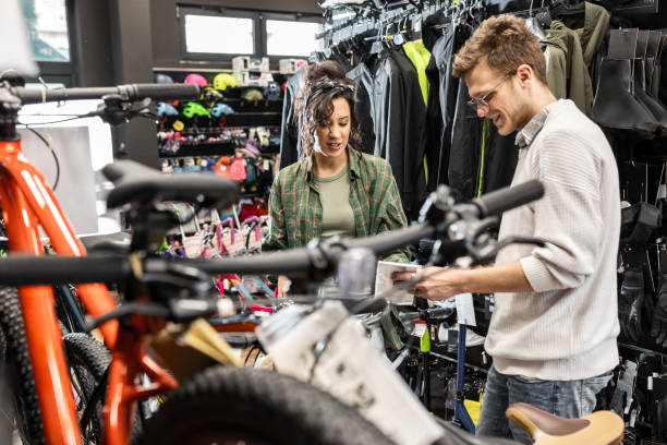 istock Salesman Helping Customer in Bike Store 2159649587