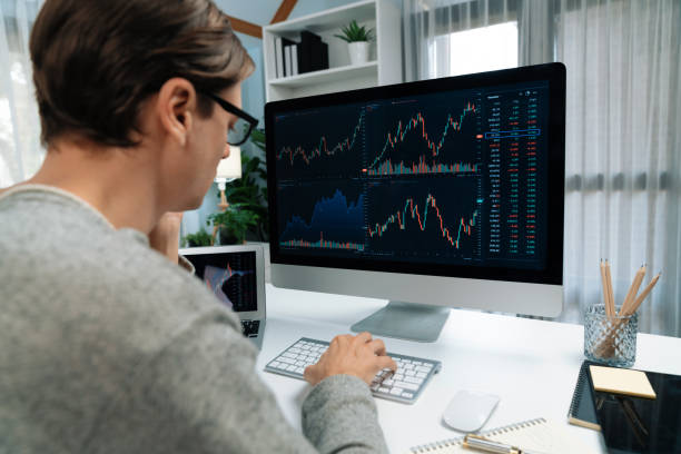 istock Business trader using computer and laptop to search high profit. Pecuniary. 2159649943