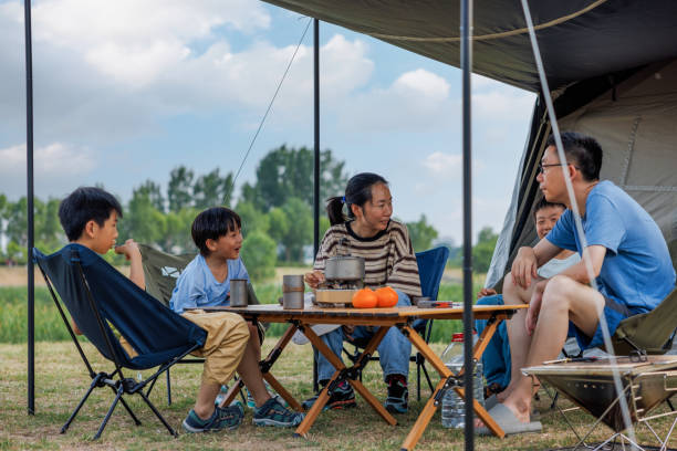 istock Young Asian families camping 2159656554