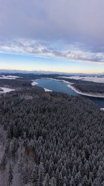 istock Winter in the Ore Mountains at the Rauschenbach Dam in Germany 2159657338