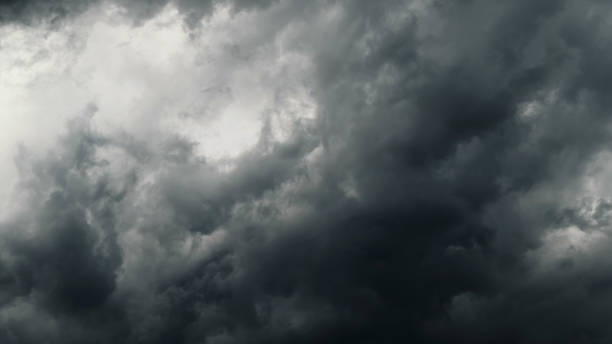 istock storm sky, dark dramatic clouds during thunderstorm, rain and wind, extreme weather, abstract background 2159661013