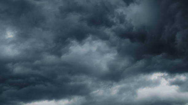 istock storm sky, dark dramatic clouds during thunderstorm, rain and wind, extreme weather, abstract background 2159661155