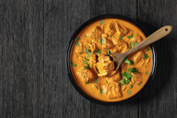 istock indian spiced fish curry, salmon masala, top view 2159661196