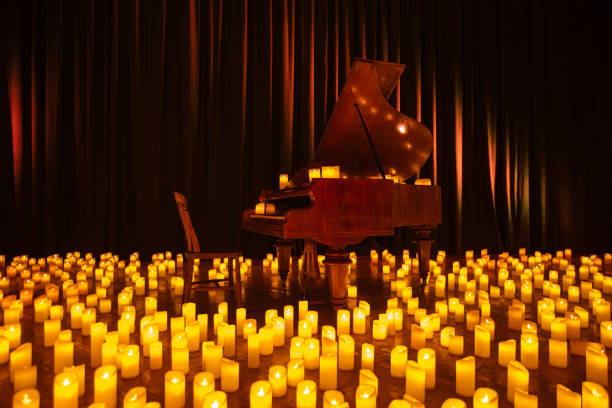 candles on classic piano candles on classic piano for design purpose expensive grand piano stock pictures, royalty-free photos & images