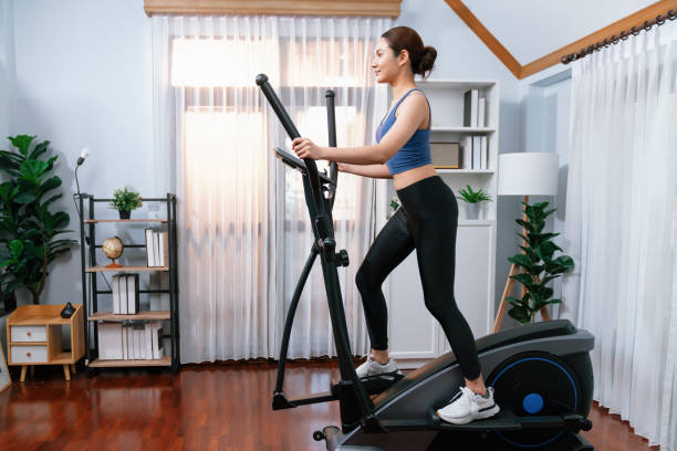 istock Energetic and strong athletic asian woman running on machine. Vigorous 2159663868