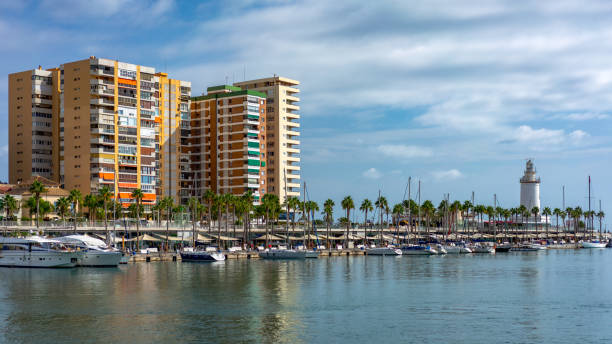 istock Malaga, Spain - September 13th 2019: Marina and lighthouse 2159664912