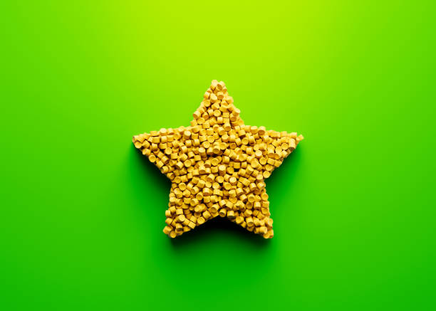 istock 3d Unique Star Shape Symbol Made Of Yellow Plastic Polymers Bright Green Background 3d Illustration 2159665713