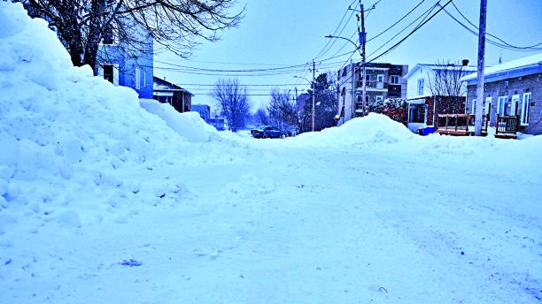 heavy snow buried entrance way of house in residential district