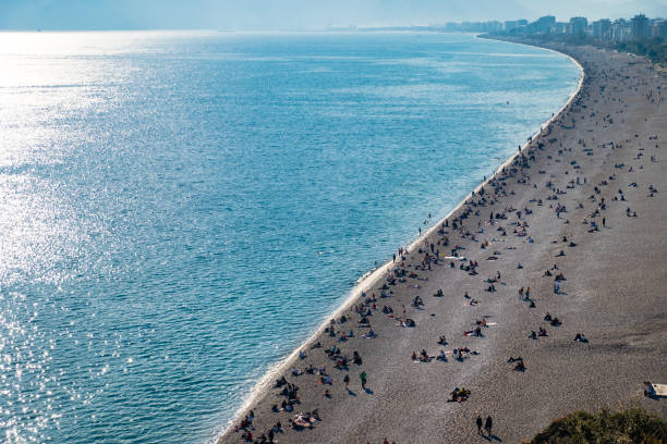 People on the Antalya coastline