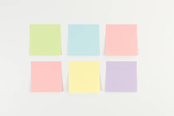 istock Top view of colorful sticky notes on white background. School, office wallpaper. 2159669091