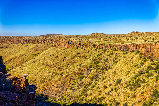 Flat-topped mountains with dolerite sill and deep valley in the Karoo National Park, Western Cape, South Africa