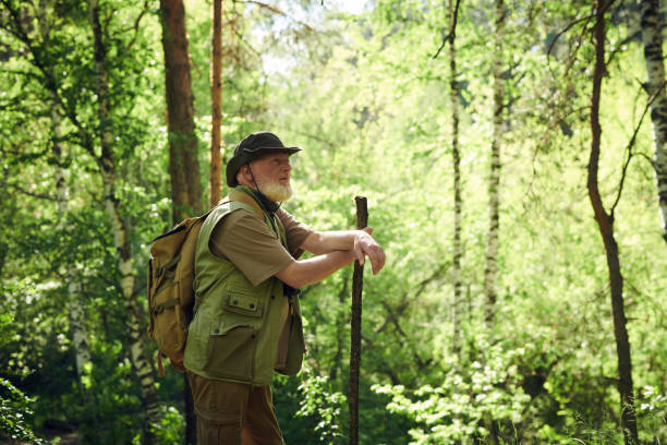 istock Senior Tourist Enjoying Fresh Air In Forest 2159671032