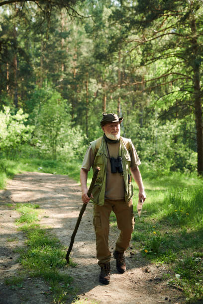 istock Naturalist Walking Along Forest Road 2159671105