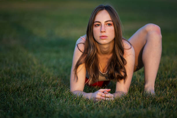 Pretty woman having a nice time on the grass