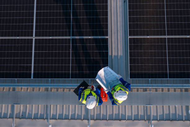istock Aerial View of Engineers Installing Solar Panels 2159674838