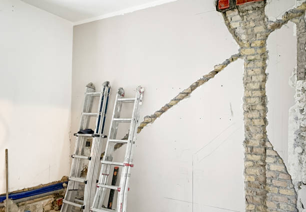 istock Home Renovation Project with Ladders and Exposed Brick Wall 2159680901
