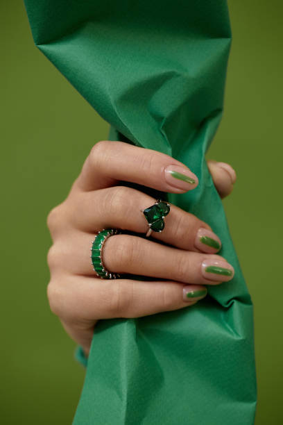 istock Precious Stone Ring on Womans Hand with Paper 2159686055