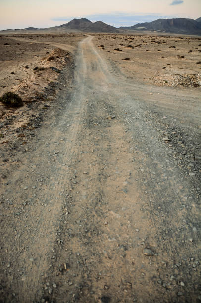 istock Countryside Desert Dirt Road 2159687234