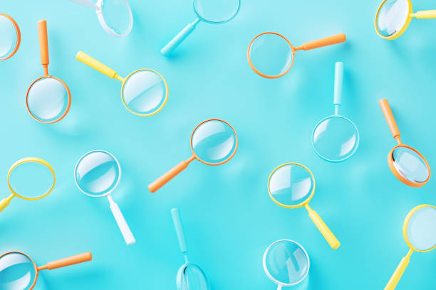 istock Search Concept - Colorful Magnifiers Over Blue Background 2159689520
