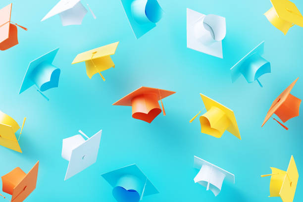 Graduation concept. Colorful tassels over blue background. Horizontal composition.
