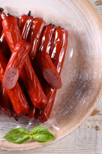 istock deli meats sausage on a wooden board for appetizer 2159690160