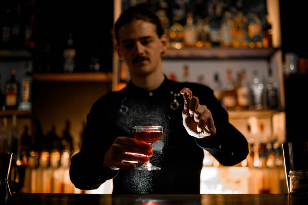 istock Professional make a alcohol cocktail in glass with whiskey, rum or cognac 2159691420