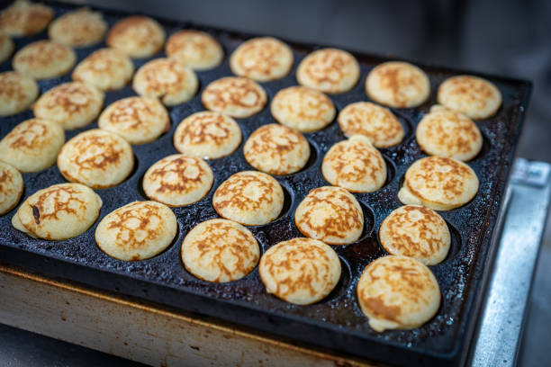 istock Making a lot of poffertjes 2159699306