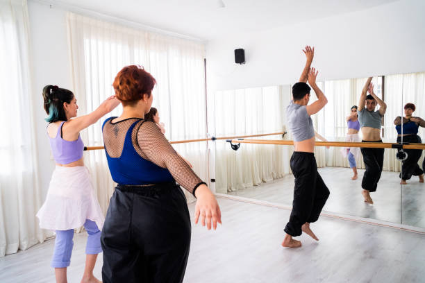 istock Rear view of dancers dancing on dance studio 2159702023