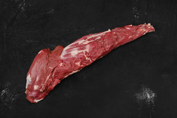 istock Overhead view of raw beef tri-tip loin 2159702304