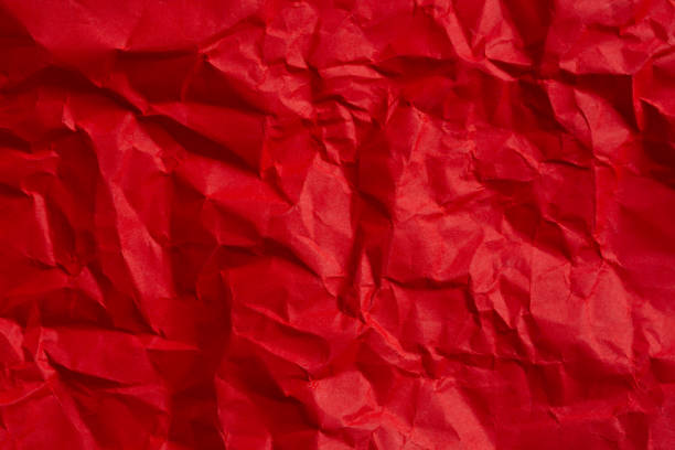 istock Wrinkled red paper texture,Rectangular crumpled sheet of red paper on a white isolated background 2159704672