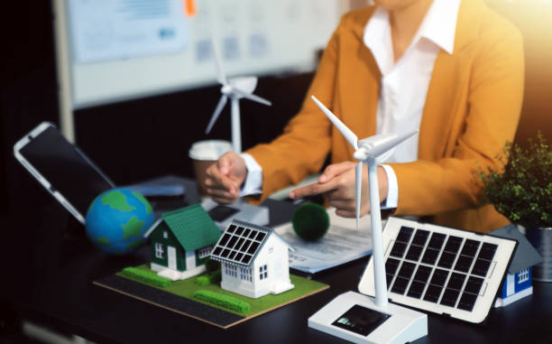 istock Carbon offset price report CO2 emission. Future growth Net zero waste in ESG ethical SME office protect climate change global warming social issues project. Group of asia people Eco friendly SDGs plan 2159705102