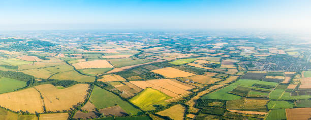 istock Aerial panorama over patchwork pasture summer farm fields agriculture crops 2159705139