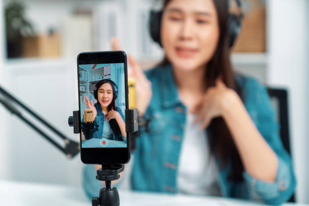 istock Selective focus phone in host channel of Asian talking online. Stratagem. 2159705380